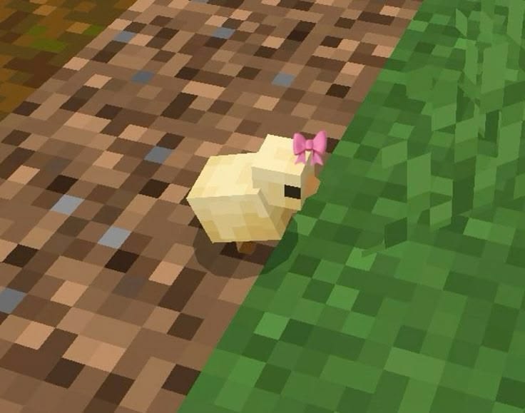 Tiny Minecraft chick with a flower